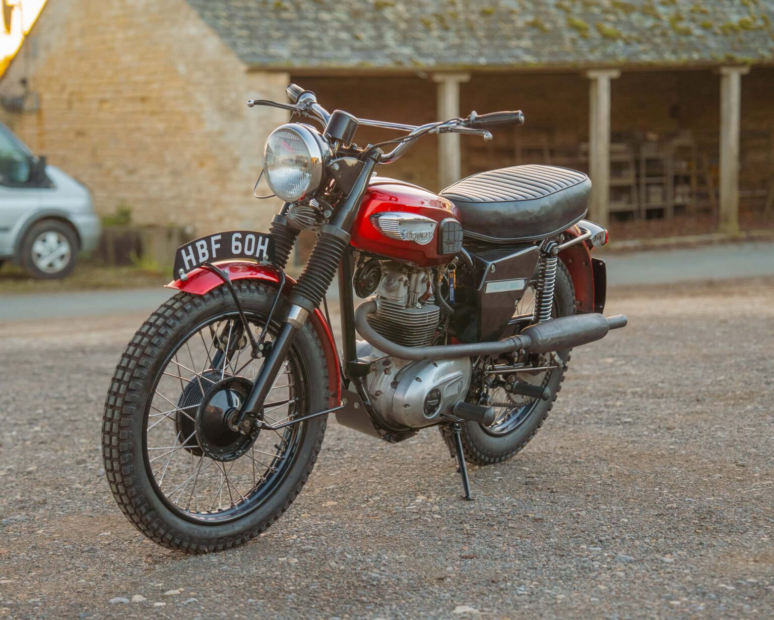 Classic motorcycle with retro design and black and red colour scheme.