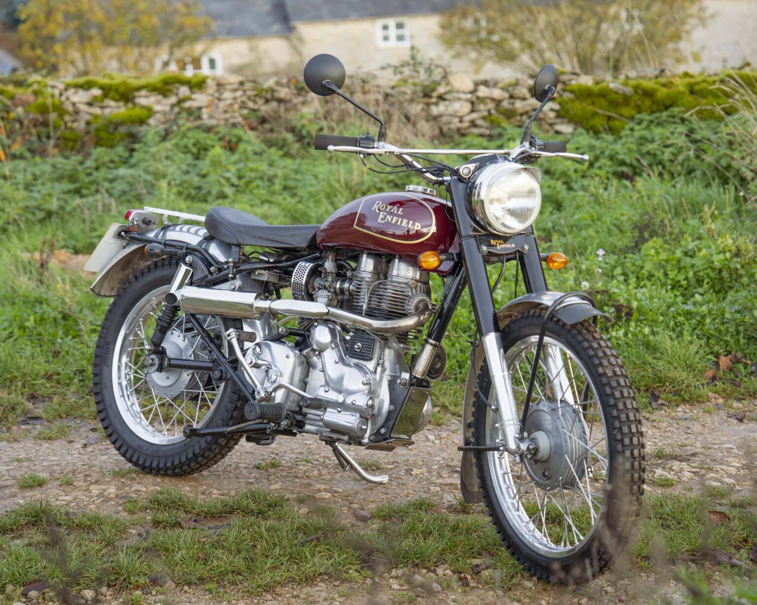 Royal Enfield Classic motorcycle with vintage design and chrome details.