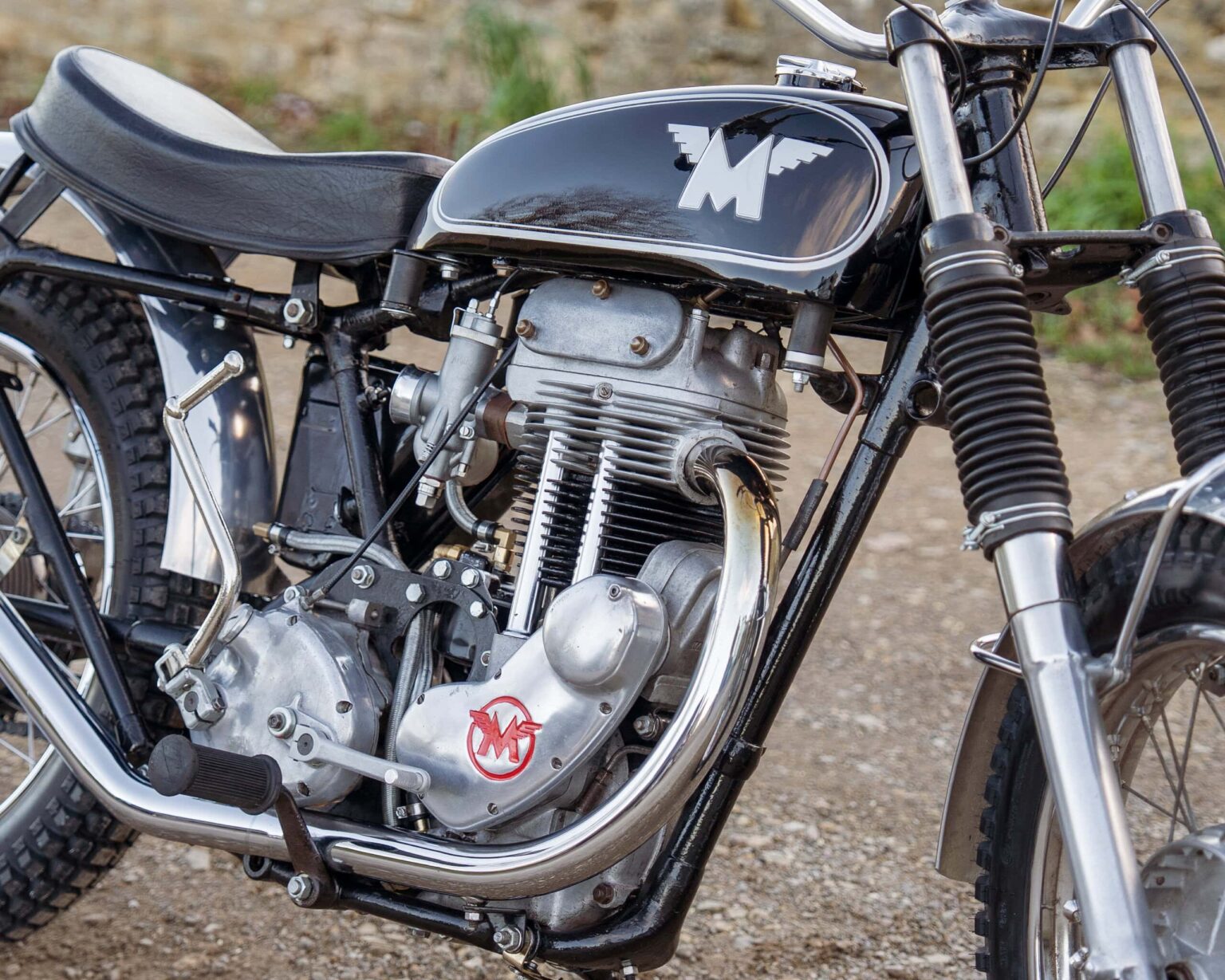 Classic Norton motorcycle engine with distinctive logo and detailed mechanical components.