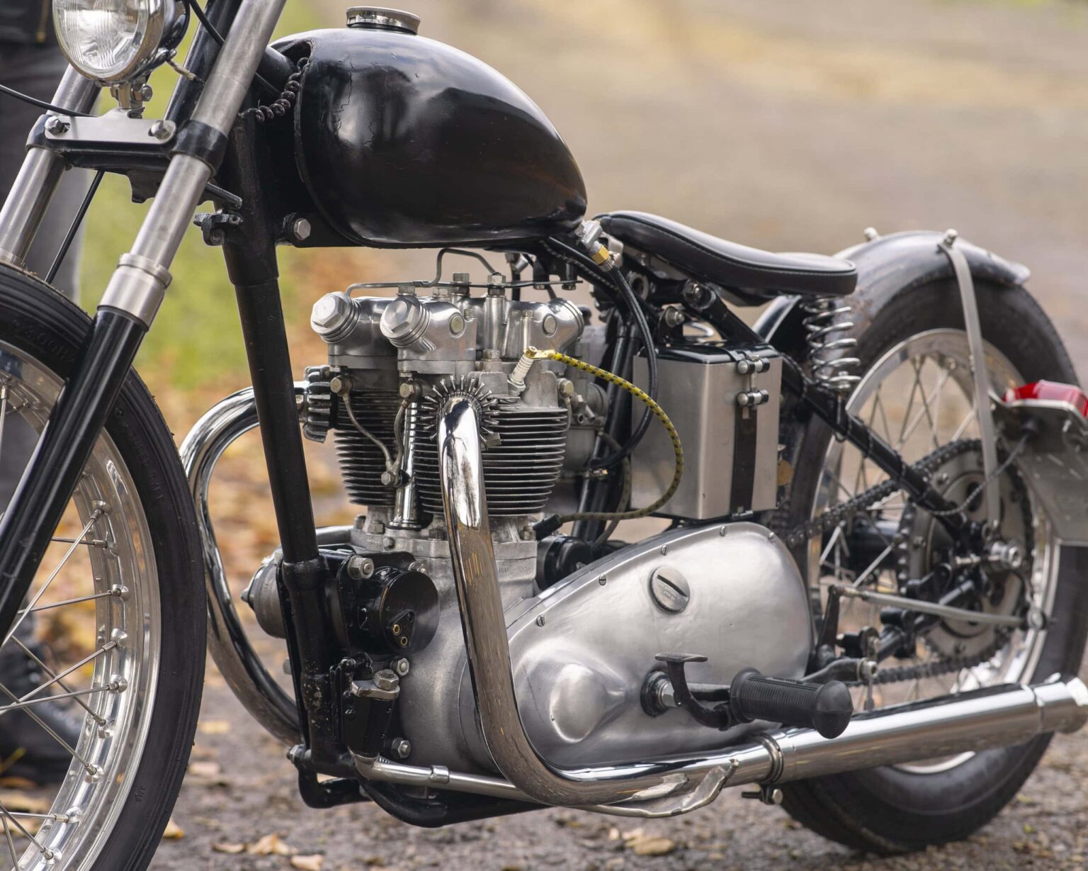 Vintage motorcycle with custom modifications and polished engine components.