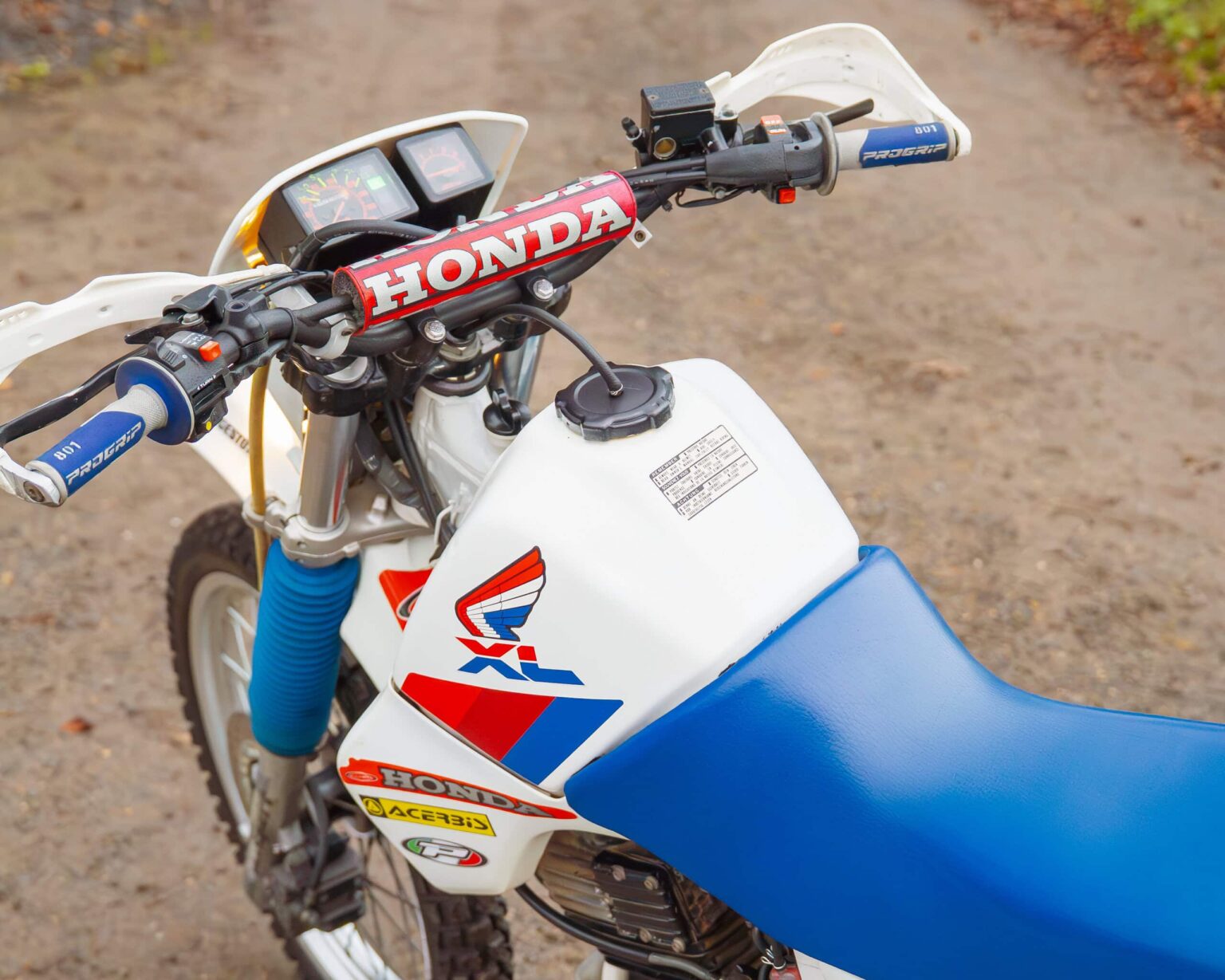 Honda XR motocross bike with racing decals and a sturdy frame.