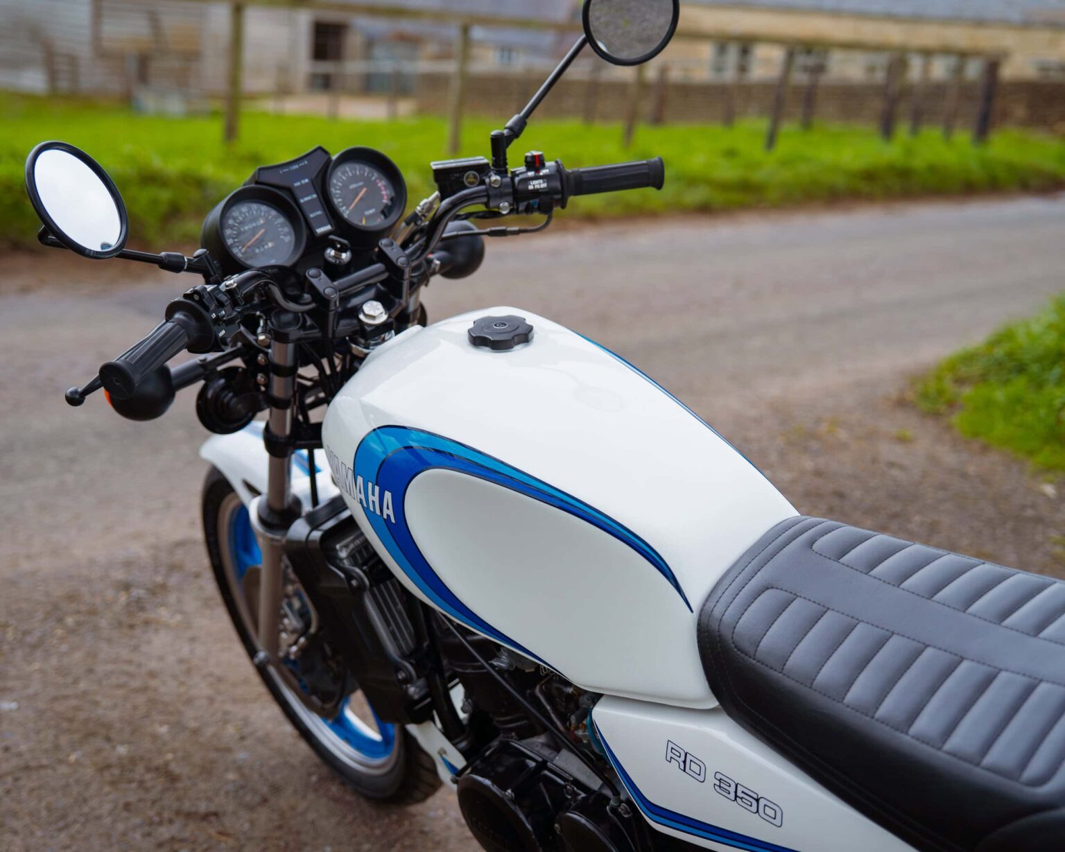 Classic Yamaha RD 350 motorcycle with vintage styling, ideal for classic shows and motorcycle enthusiasts.
