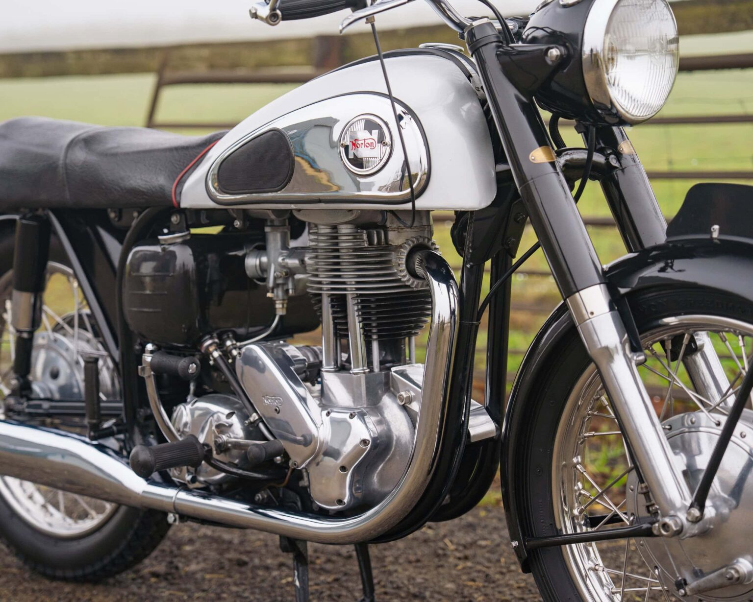 Vintage Norton motorcycle with classic design and chrome details.