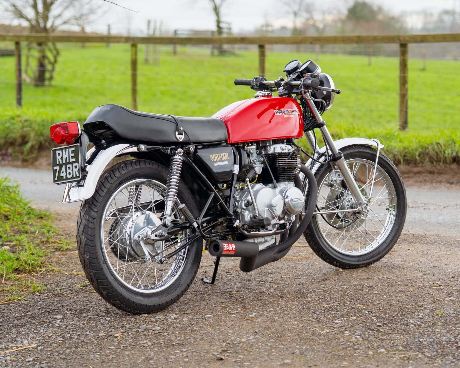 Vintage red motorcycle for classic car and bike enthusiasts. Perfect for vintage racing and nostalgi.