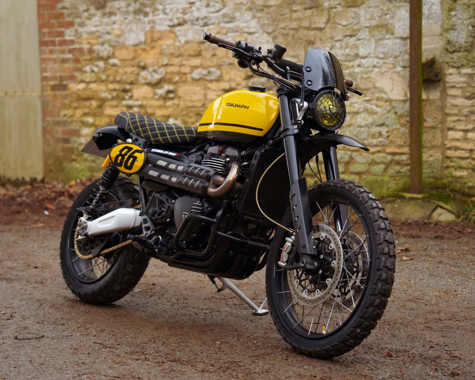 Triumph Scrambler motorcycle with vintage styling and off-road capabilities.