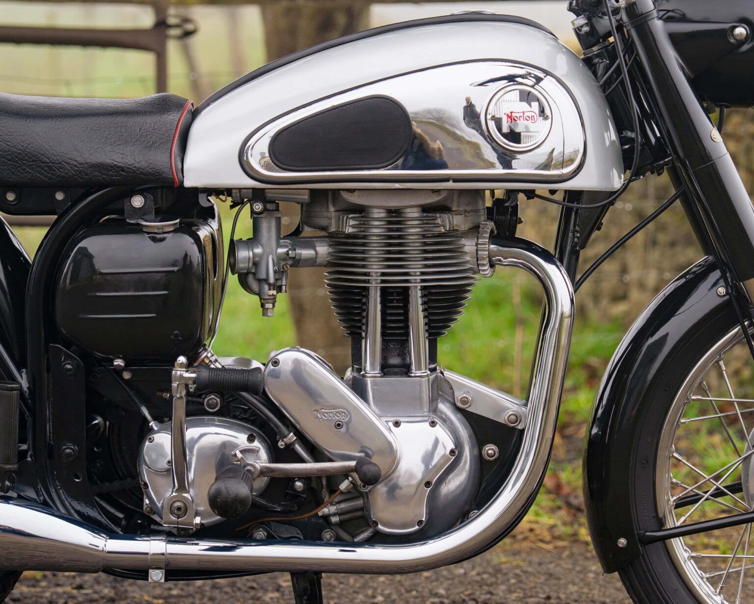 Vintage motorcycle engine, classic design, and detailed craftsmanship.