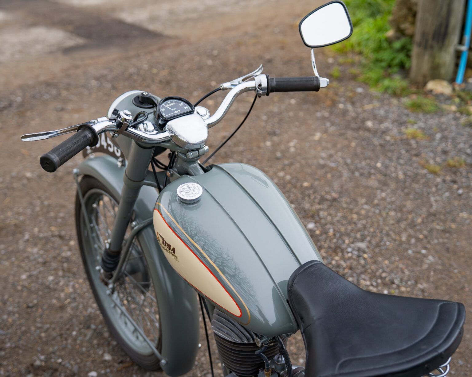 Honda vintage motorcycle with retro design and chrome details.