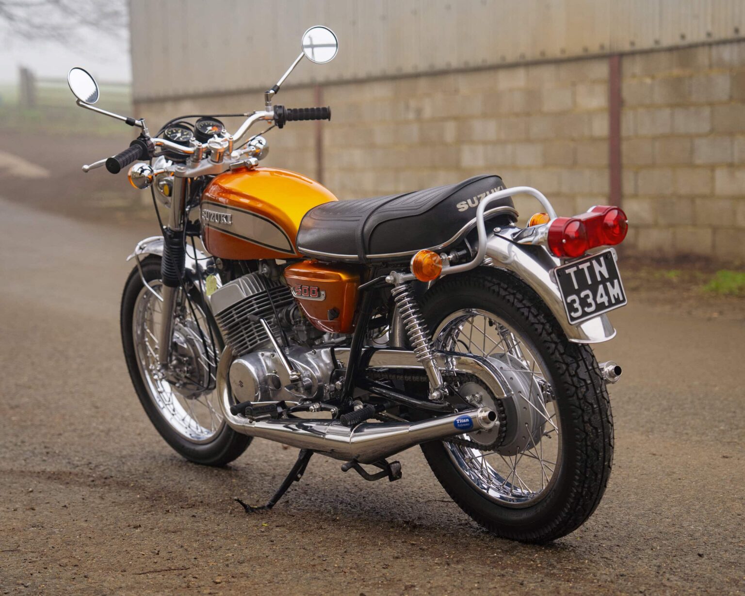 Classic Honda motorcycle with retro design and chrome details.