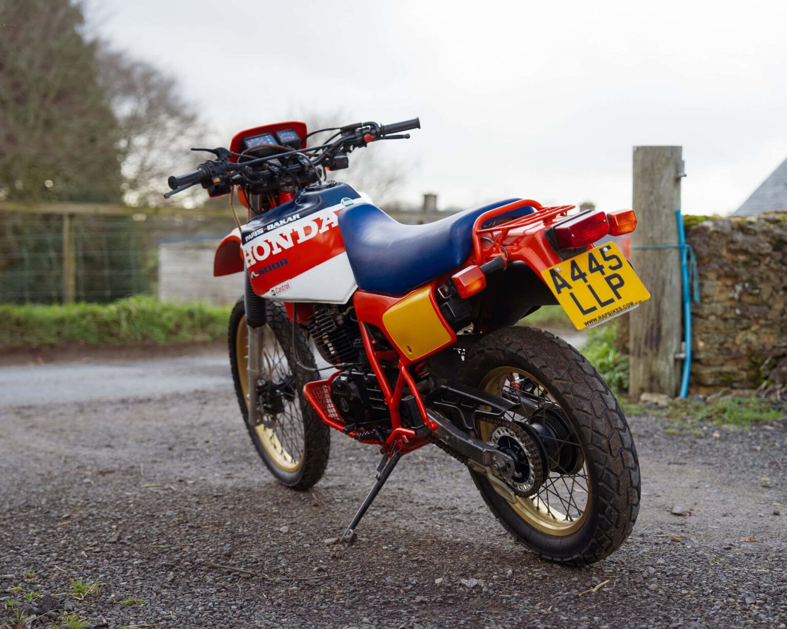 Vintage Honda dirt bike for classic motorcycle racing events.