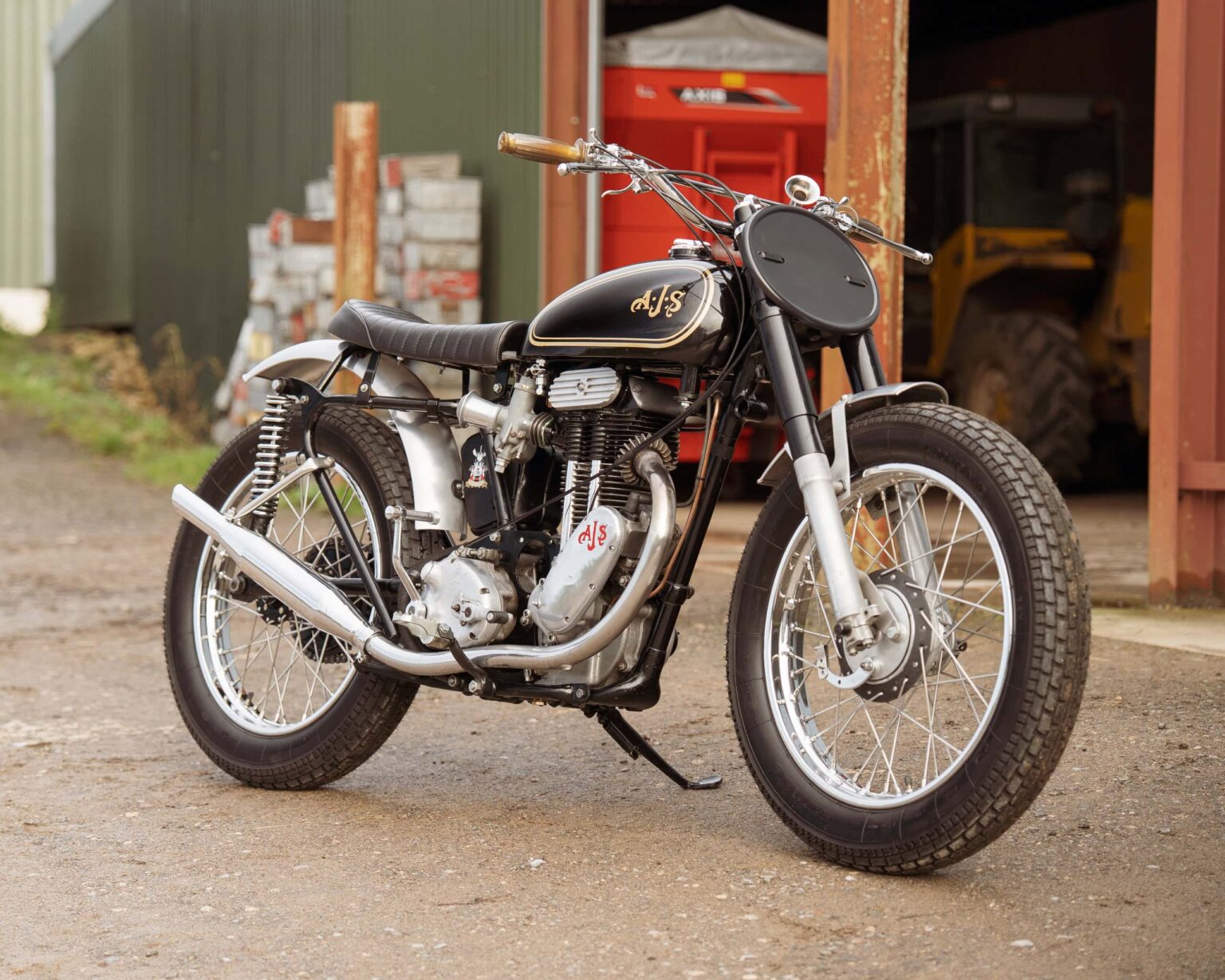 Vintage motorcycle with black and chrome finish, restored for classic bike enthusiasts.