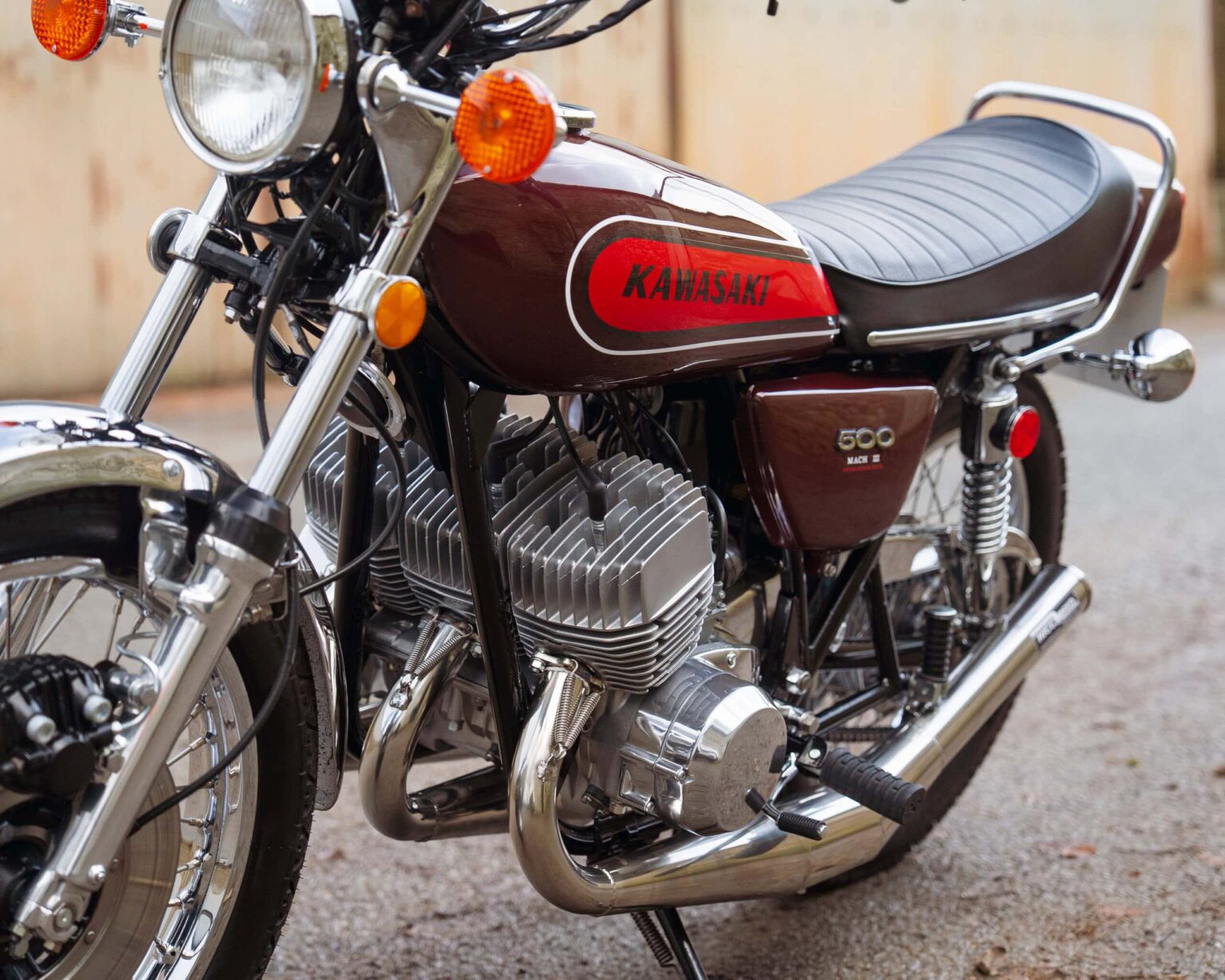 Kawasaki vintage motorcycle with a sleek design and chrome details.