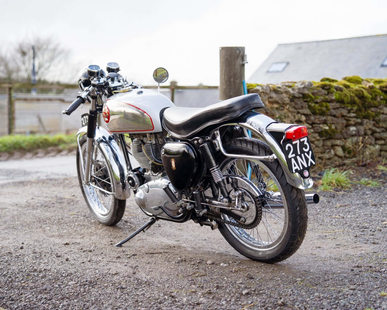 Vintage motorcycle with classic design and chrome details.