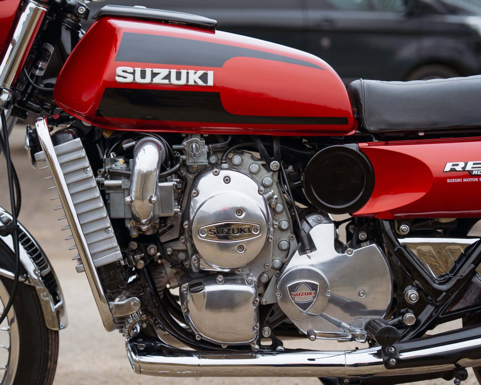 Classic Suzuki motorcycle engine close-up.