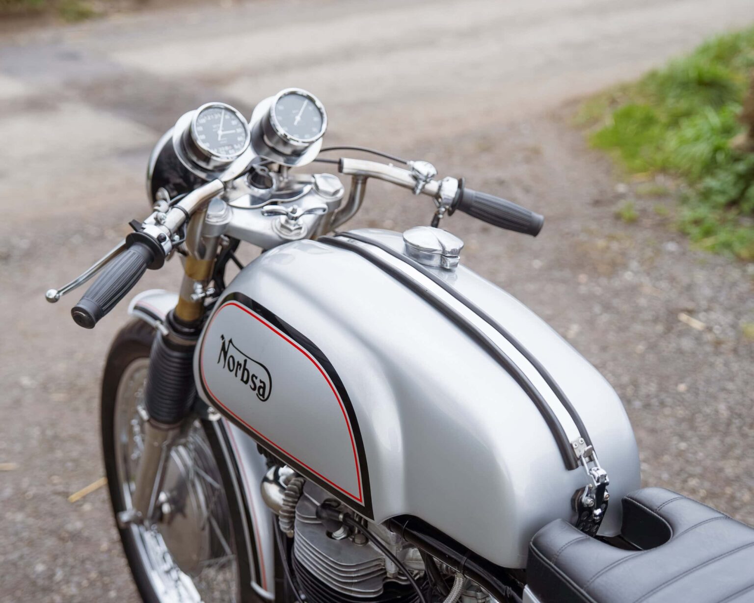Vintage Norton motorcycle with classic design and chrome details.