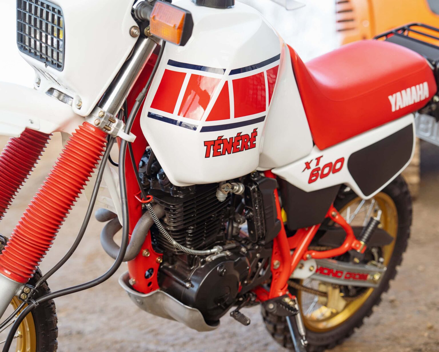 Classic Yamaha XT 600 Enduro motorcycle with vintage racing decals.