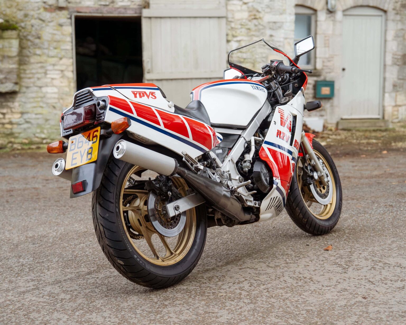 Classic Yamaha YPVS racing motorcycle with vintage design and racing decals.