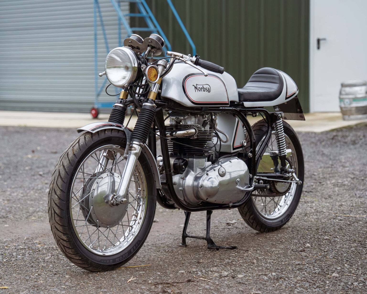 Norton vintage motorcycle with retro design and chrome details.